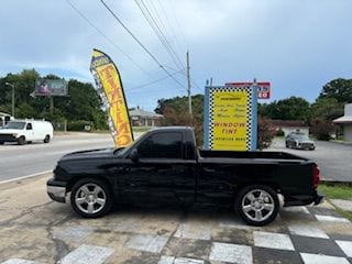 Dark automotive glass after professional installation